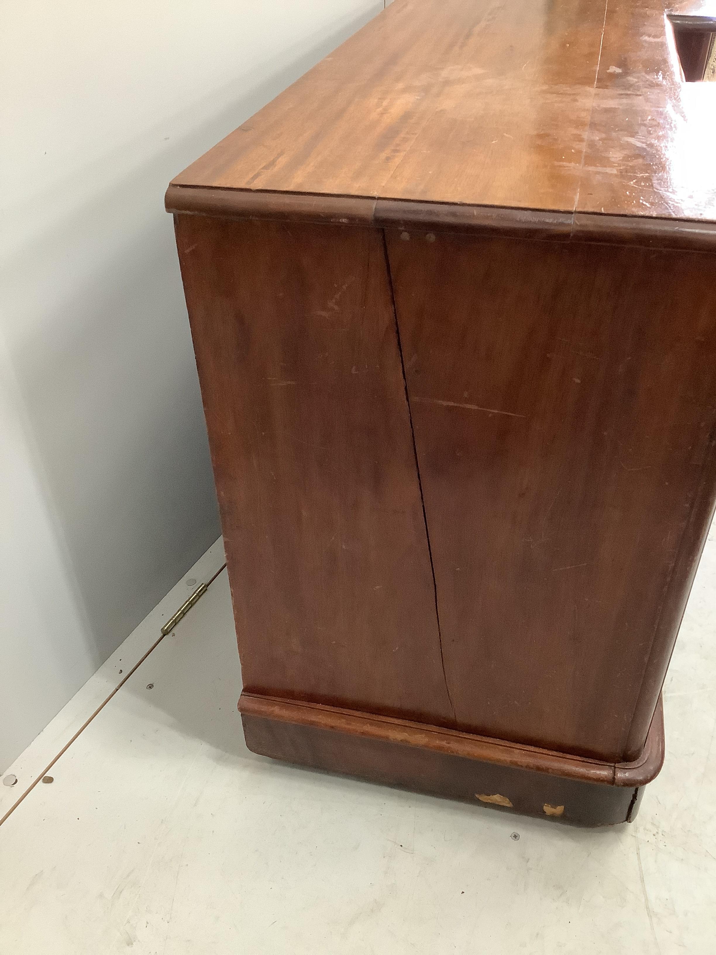 A Victorian inverse breakfront mahogany sideboard, width 124cm, depth 48cm, height 76cm